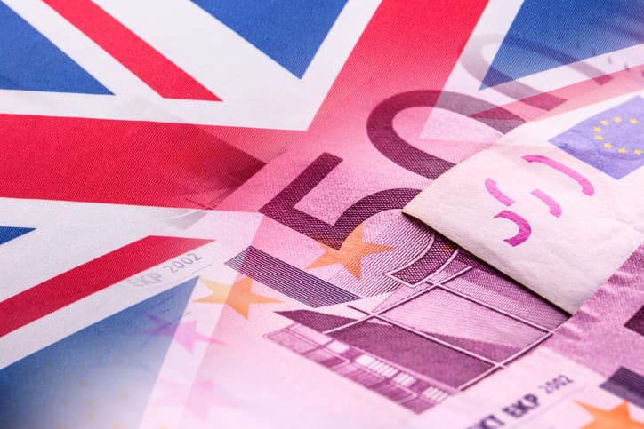 Flags of the United kingdom and euro banknotes