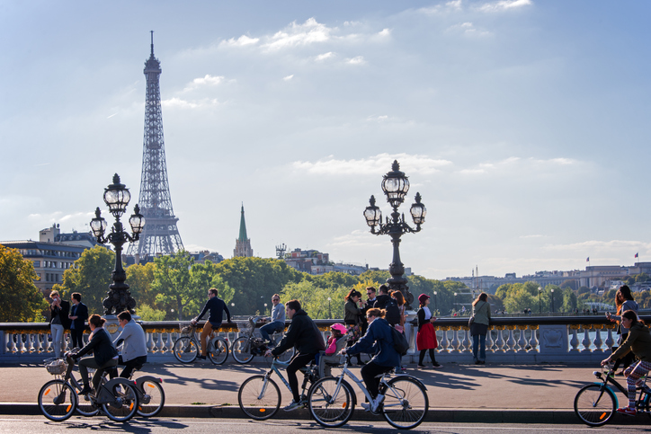 People on a bicycle in the streets